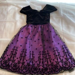 Jona Michelle girls formal dress size 12.  Purple/Black.  Machine washable.